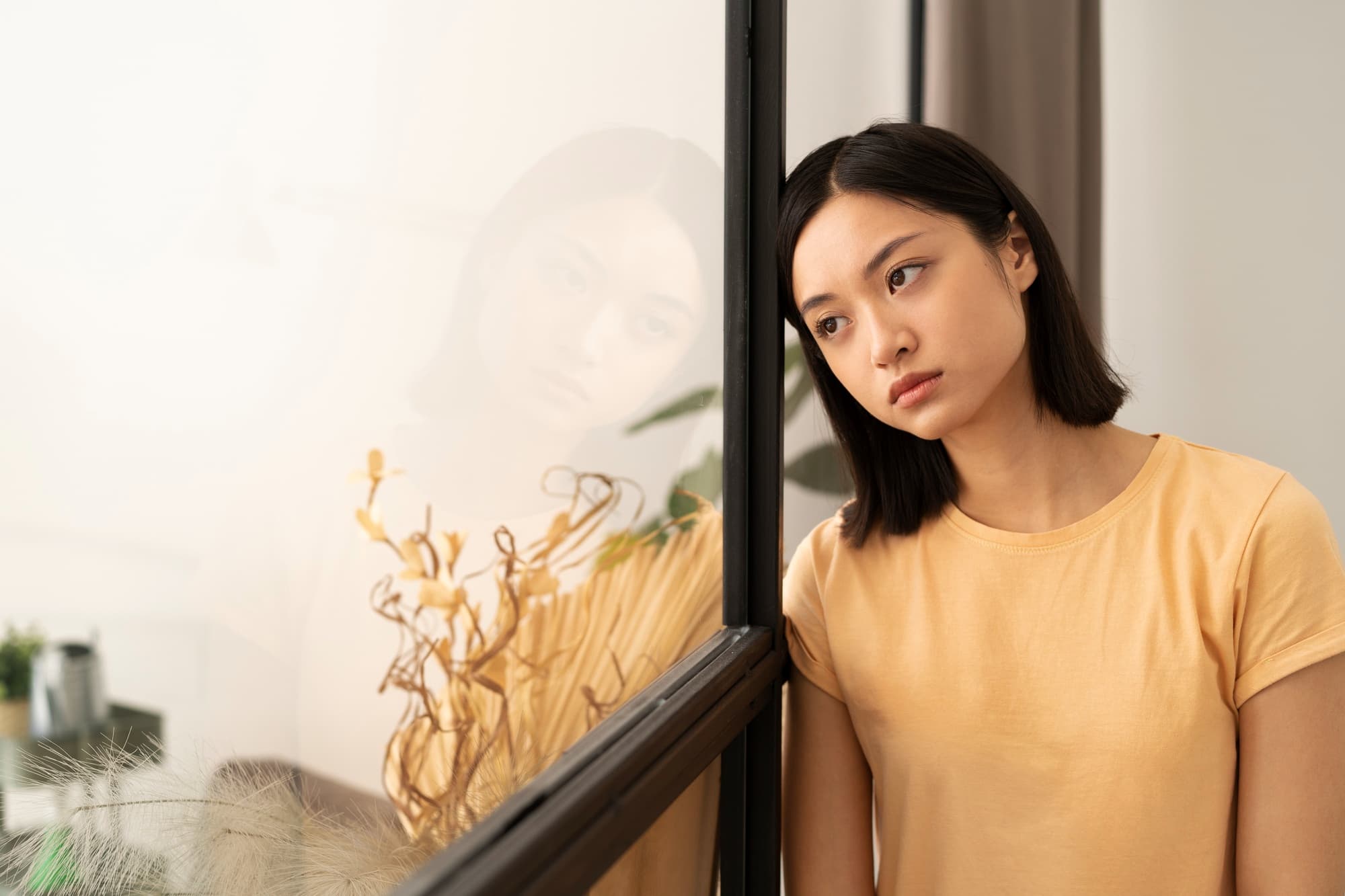 A person coping with breakup and its emotional pain.