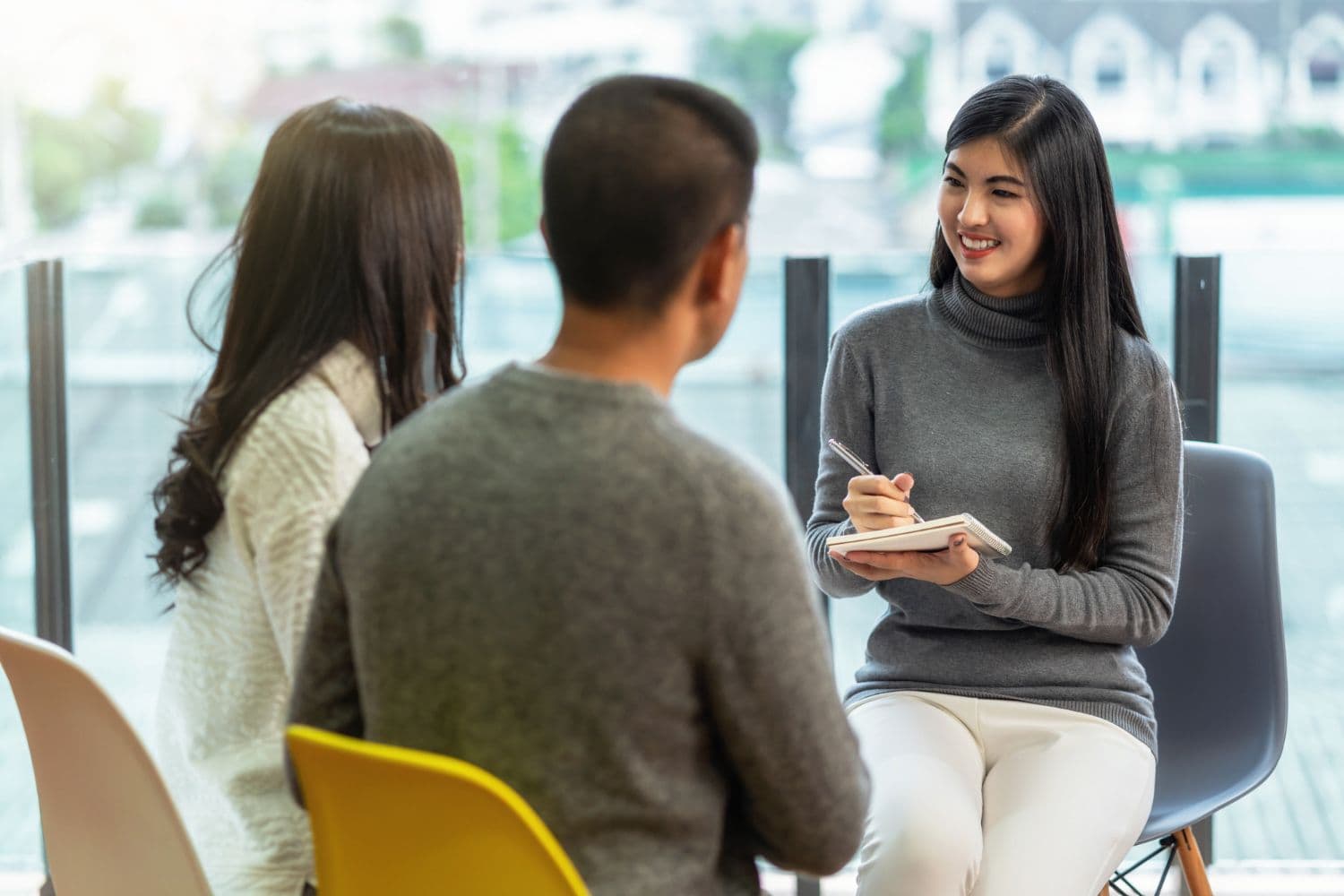 A Singaporean couple engaging in couples counselling to understand and work on their attachment styles.