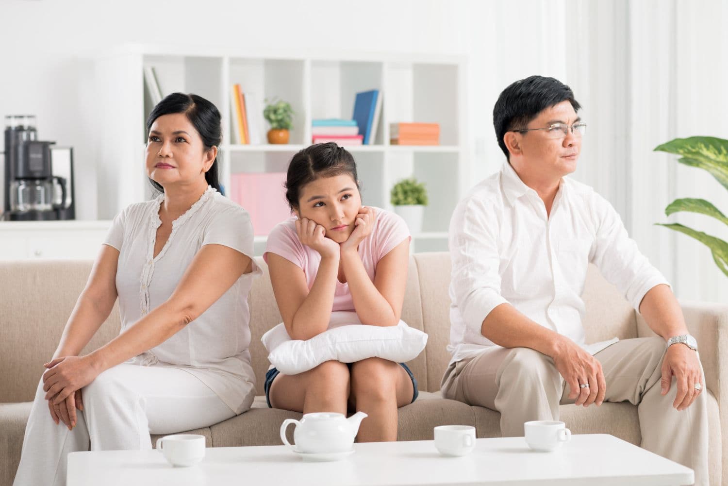 A family experiencing an argument and considering family conflict counselling in Singapore.