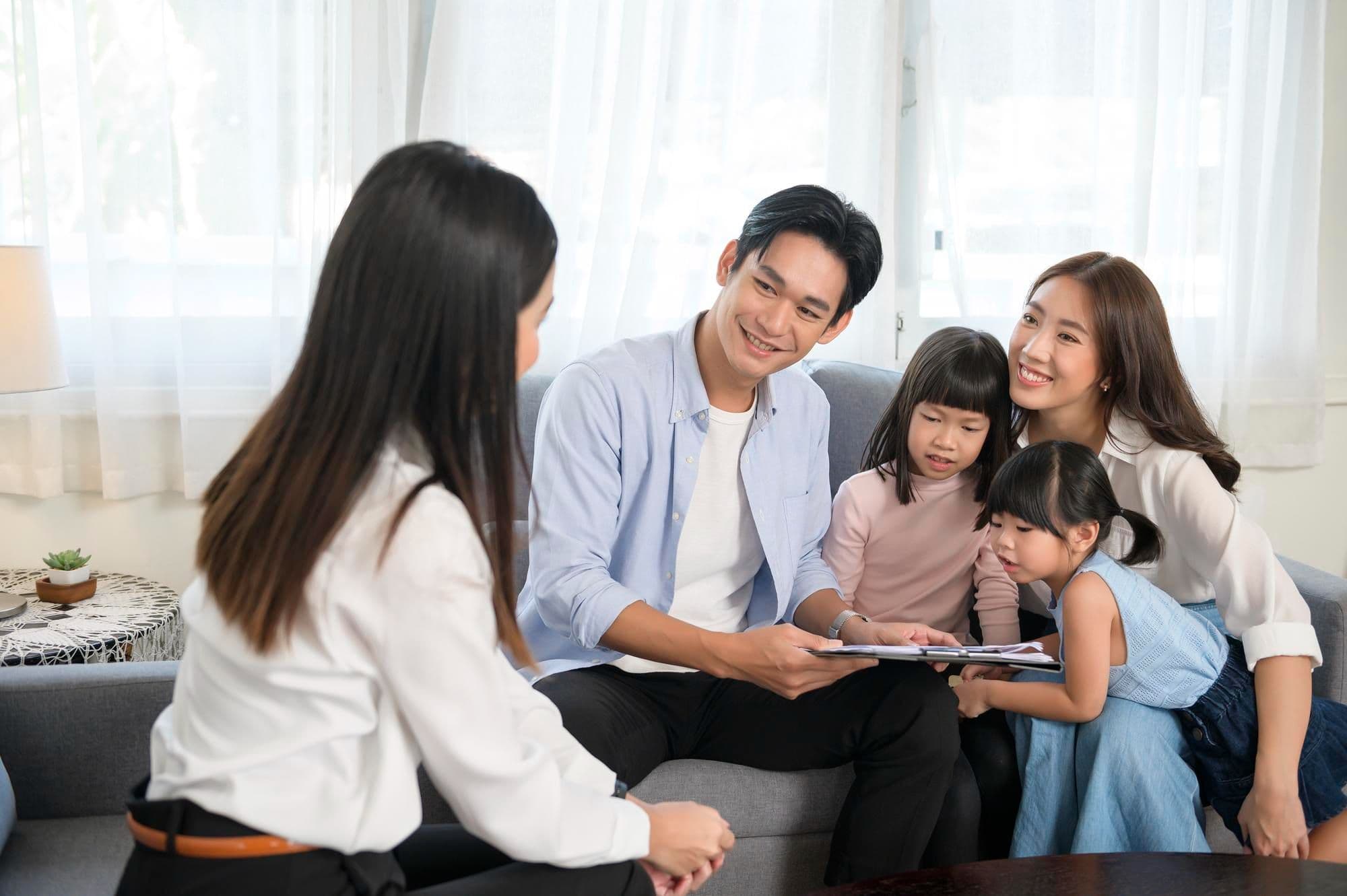 A young family engaging in family conflict counselling in Singapore.