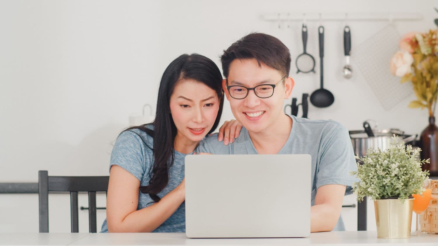A couple reviewing their progress after engaging in couples therapy in Singapore.