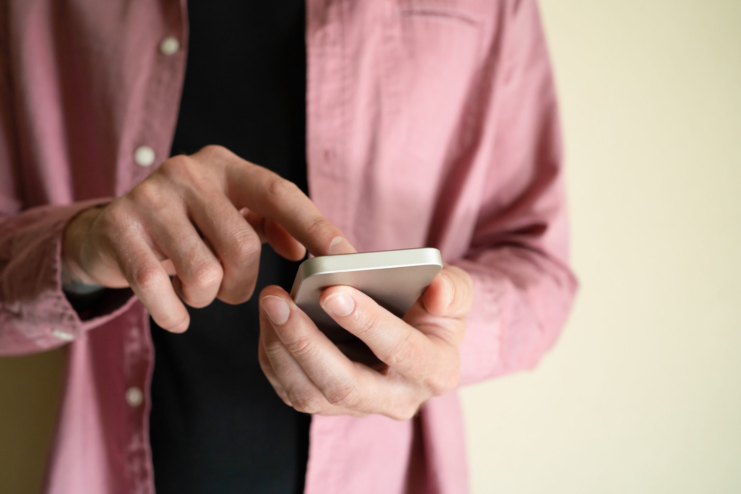 A person turning off their phone to preapre for the online counselling session in Singapore.