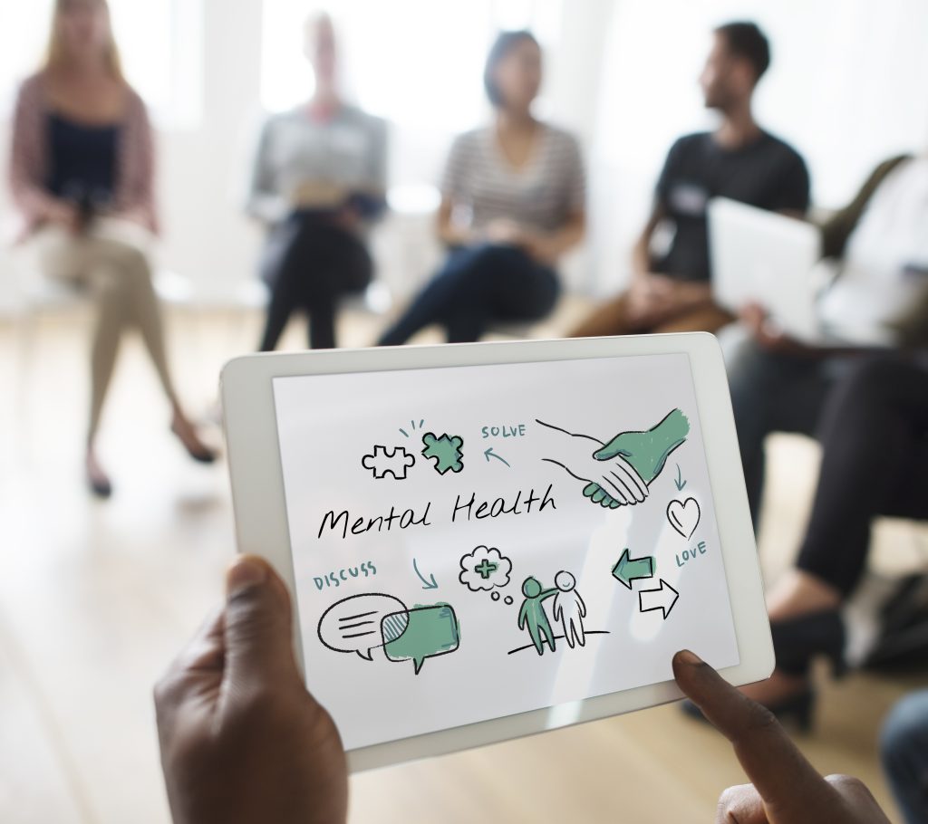 Group therapy session for spreading mental health awareness.