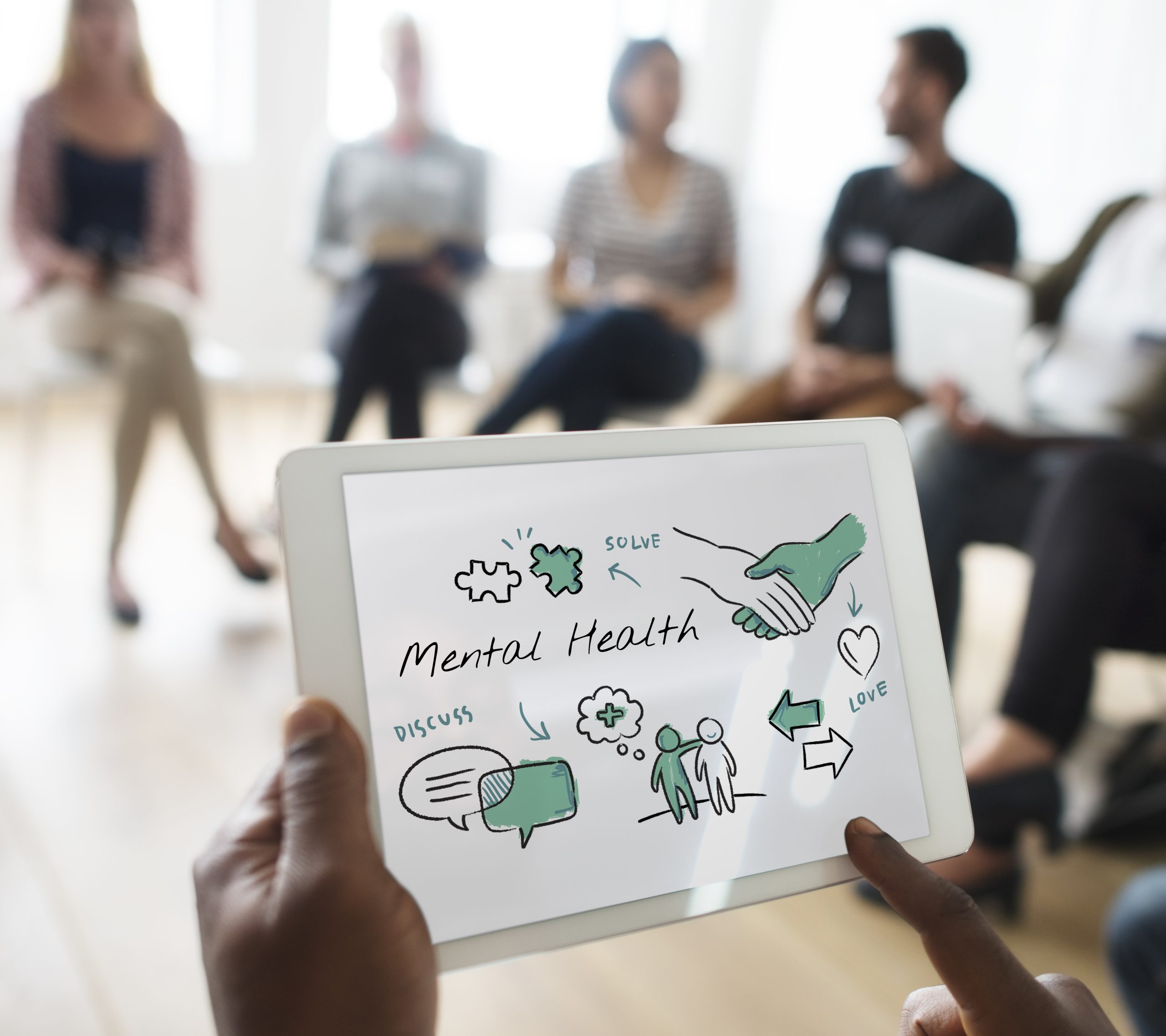 Group therapy session for spreading mental health awareness.