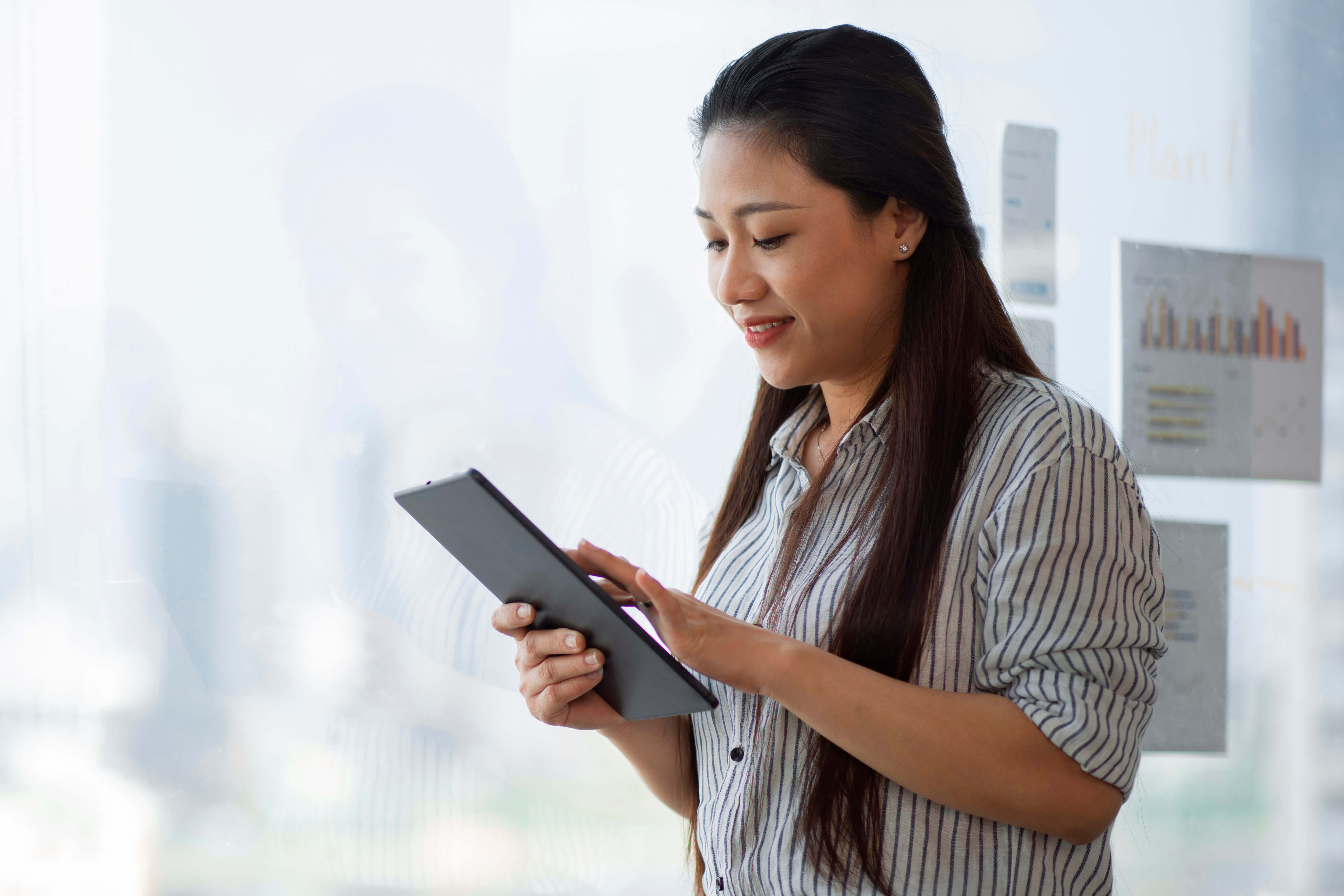 Person using a tab to find a therapist in KL