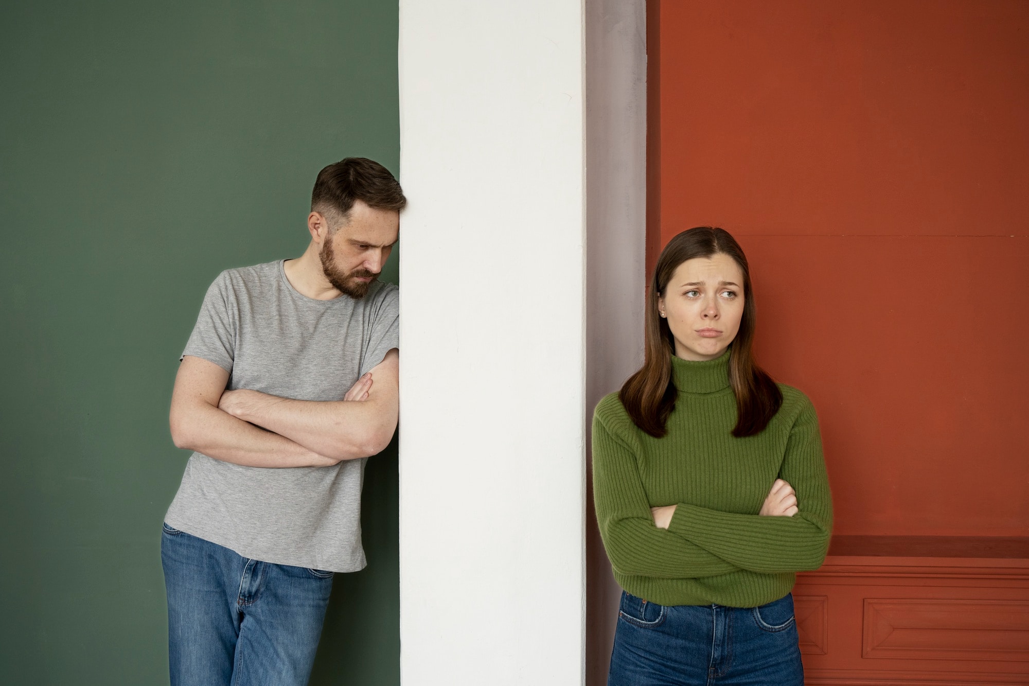 A young couple ignoring each other after a fight.